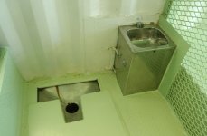 The bathroom facility in a typical cell at Camp Delta, Naval Station Guantanamo Bay, Cuba