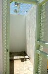 Cell blocks in Camp Delta, Naval Station Guantanamo Bay, Cuba, have two shower stalls outside the end of the block