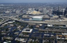 Aerial image of the New Orleans Superdome and flooded neighborhood in the wake of Hurricane Katrina