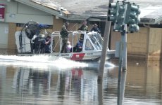 U.S. Coast Guard air boat in a flooded street of New Orleans in the wake of Hurricane Katrina