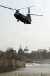 CH-47 Helicopter dropping sandbags in the New Orleans 17th Street Canal levee breach in the wake of Hurricane Katrina