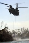 CH-47 Helicopter dropping sandbags in a New Orleans levee breach in the wake of Hurricane Katrina
