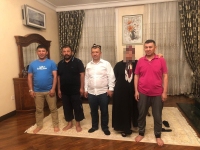 From left to right, Saimaiti said, this photo shows Alimujiang Hadeer, Nabi Hadeer, Maimaitili Hadeer, an unidentified woman, and the head of the family, Khabibula Abdukadyr.