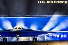 A B-21 Raider is unveiled at Northrop Grumman's manufacturing facility at Air Force Plant 42 in Palmdale, Calif., Dec. 2, 2022. The B-21 will be a long-range, highly survivable, penetrating strike stealth bomber capable of delivering both conventional and nuclear munitions.