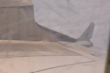 Grainy image of an aircraft.