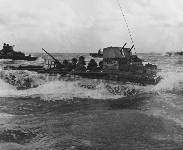 LVT carrying assault troops from Saipan to Tinian. More than half of the 140 LVTs used to Land the assault force were crewed by the U.S. Army. The Tinian invasion is the only major amphibious assault to be launched from land by LVTs that...