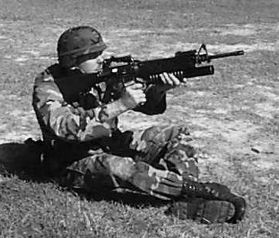 Figure 5-7. Sitting position, cross-ankled, quadrant sight.