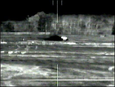 Figure E-44. Dust cloud from moving vehicle.