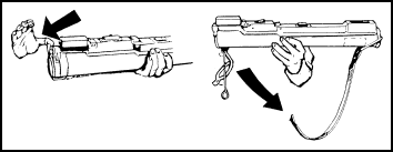 Figure 2-16. Removing the front cover and the adjustable sling assembly.