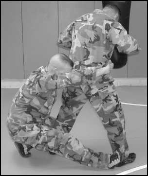 Figure 5-17. Rear takedown, step 2