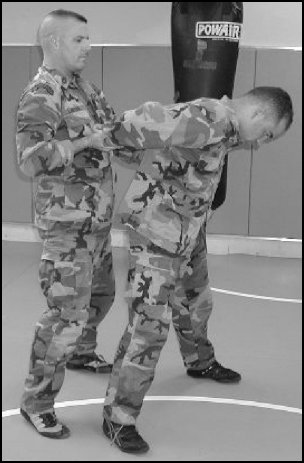 Figure 5-27. Headlock with punches, step 3 (continued).