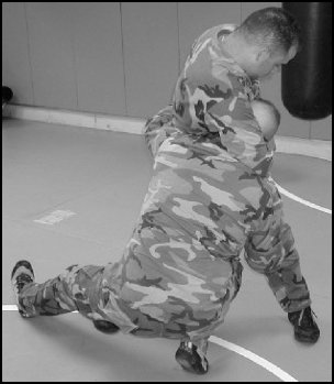 Figure 5-29. Headlock without punches, step 2.