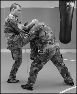 Figure 6-14. Knee strike.