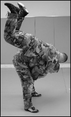 Figure 8-1. Defense against the standing rear naked choke (continued).