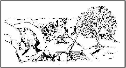 Figure 8-3. Dispersing vehicles seek cover for protection against air observation