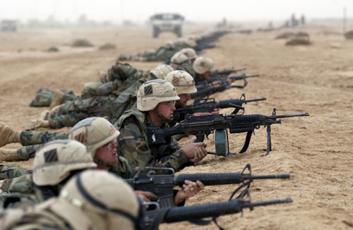 Soldiers from the 3d Infantry Division (Mechanized) in firing positions during Operation Iraqi Freedom. 