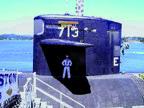 The topside watch finds a little shade