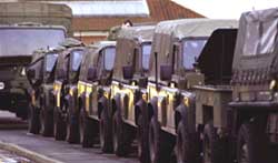 Royal Irish Regiment vehicles prepare to depart for Iraq