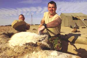 Joint patrol in Basrah by a Royal Military Policeman and an Iraqi policeman