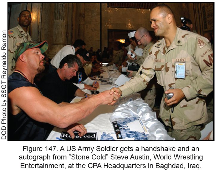 Figure 147. A US Army Soldier gets a handshake and an autograph from 'Stone Cold' Steve Austin, World Wrestling Entertainment, at the CPA Headquarters in Baghdad, Iraq. Figure 147. A US Army Soldier gets a handshake and an autograph from 'Stone Cold' Steve Austin, World Wrestling Entertainment, at the CPA Headquarters in Baghdad, Iraq.
