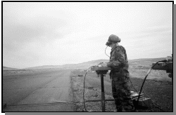 Photo of soldier conducting imagery analysis