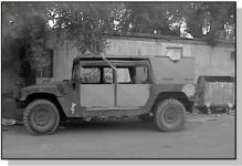 Figure 1. 4-seat HMMWV (side view)