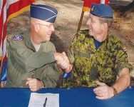 Photo of author (left) and Canadian air force lieutenant general Marc Dumai