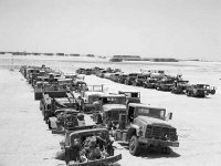Photo showing Some Trucks Used in OIF that Need Repair