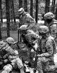 U.S. Soldiers from the 52d Signal Battalion practice small-unit tactics during a warrior training exercise at the Boeblingen Local Training Area in Germany, 5 May 2009
