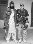 LEP Donnie Young with an Afghan narcotics police officer. The LED program was conceived by the Joint Improvised Explosive Device Defeat Organization.