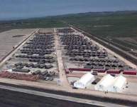 Photo showing Hundreds of tents stretch out on the plains near Fier, Albania, as the United States builds the tent city of Camp Hope