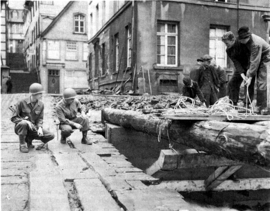 BUILDING A BRIDGE IN MONSCHAU. Captain Goetcheus second from the left.