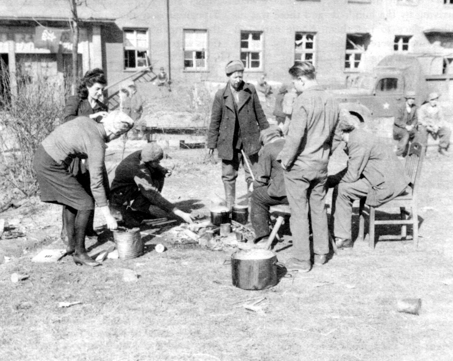 RUSSIAN DPS PREPARE MEAL IN CAMP AT TRIER