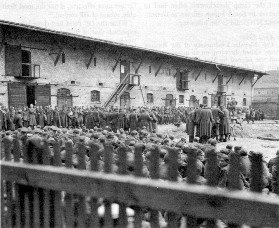 CAPTURED GERMANS IN AN IMPROVISED STOCKADE