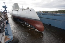 The Zumwalt-class guided-missile destroyer DDG 1000 is floated out of dry dock at the General Dynamics Bath Iron Works shipyard on Oct. 28, 2013