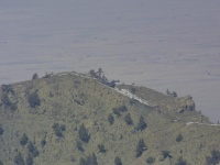 Photo showing 'Razor 01', an MH-47E Chinook helicopter, sitting atop Takur Ghar, the site of a battle between U.S. special operations forces and al Qaeda fighters during Operation Anaconda in Marchd 2002. The battle resultted in the death of 7 US servicemen