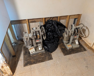 Illegal pill press machines used by drug traffickers to make counterfeit pharmaceutical pills.