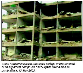 Saudi Arabian television broadcast footage of this remnant of an expatriate compound near Riyadh after a suicide bomb attach, 12 May 2003. [AFP photo]