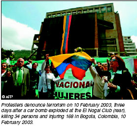Protesters denounce terrorism on 10 February 2003, three days after a car bomb exploded at the El Nogal Club killing 34 persons and injuring 168 in Bogota, 10 February 2003.