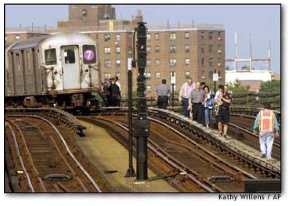 Photo showing passengers exiting a New York City Transit subway train during the 2003 blackout.