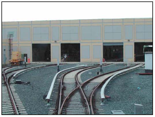 Photo depicting well-planned and secure railroad storage facilities for track cars and equipment