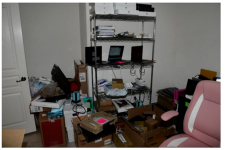 Christina Chapman organized and stored U.S. company laptops in her home, and included notes identifying the U.S. company and identity associated with each laptop.(photo 2)