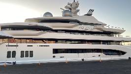 Large yacht 300-foot yacht with name 'the Amadea' displayed at the top