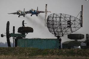 A Russian Su-25 fighter plane takes part in combat training.