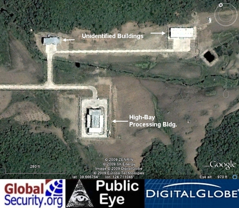 The high-bay assembly building and two unidentified support buildings